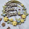 Home Sweet Home hanging sign with layered words, birdhouse and flowers. Sample